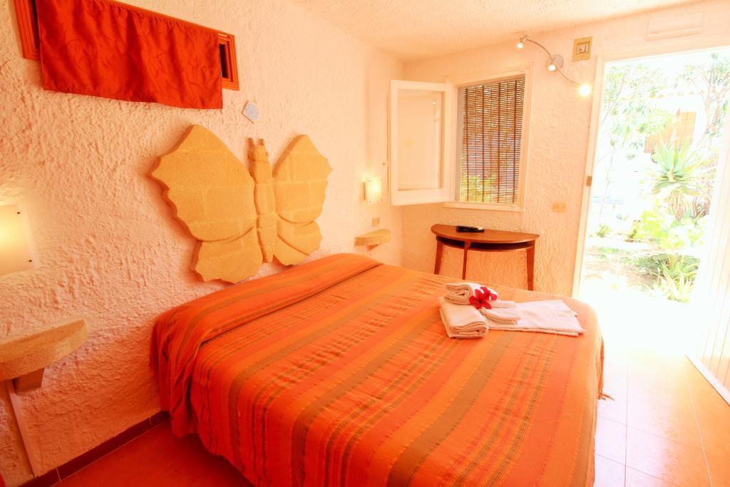 L'Oasi Villaggio Albergo ファヴィニャーナ エクステリア 写真