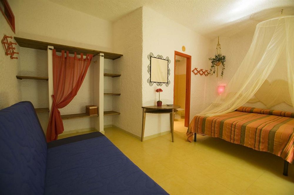 L'Oasi Villaggio Albergo ファヴィニャーナ エクステリア 写真