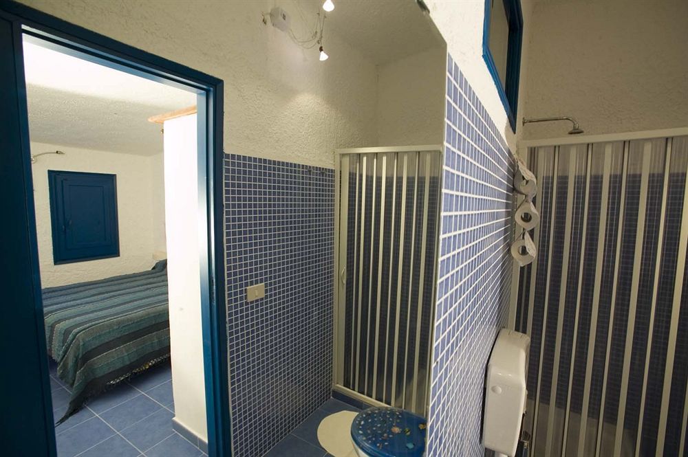 L'Oasi Villaggio Albergo ファヴィニャーナ エクステリア 写真